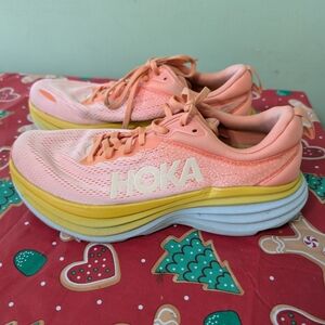 Hoka Peach and Yellow Running Shoes